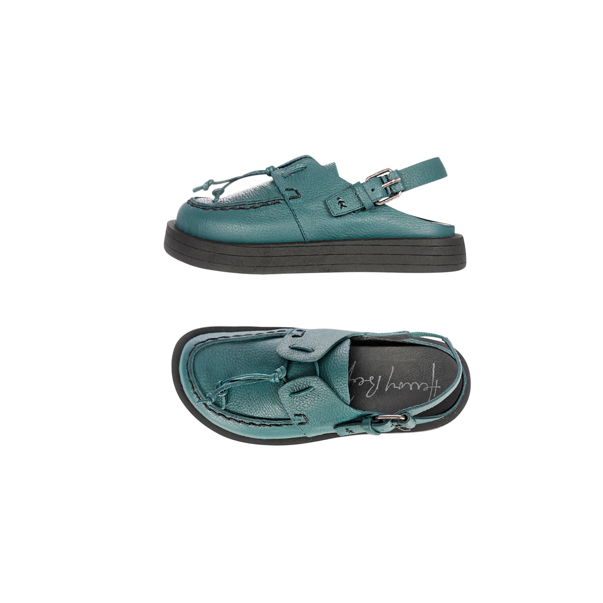 teal open back moccasin shoes with adjustable back strap, round toe, and black rubber sole.